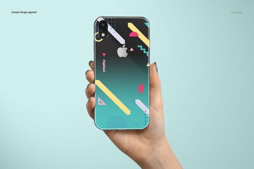 PSD mockup of an iPhone XR clear case with a vibrant geometric design, displayed in a hand against a soft blue background.