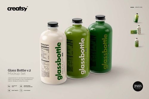 Front view of three glass bottles with different shades of green, PSD mockup with editable label designs.