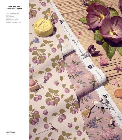 Cotton fabric mockup with floral and cherry patterns, arranged on a wooden surface with sewing tools and flowers.