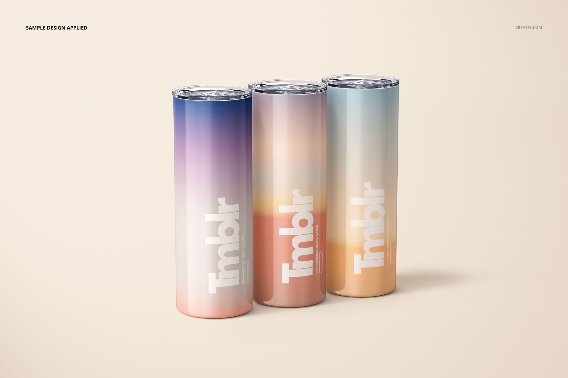 Front view of three 20oz skinny tumblers with gradient pastel designs, standing upright on a light background.