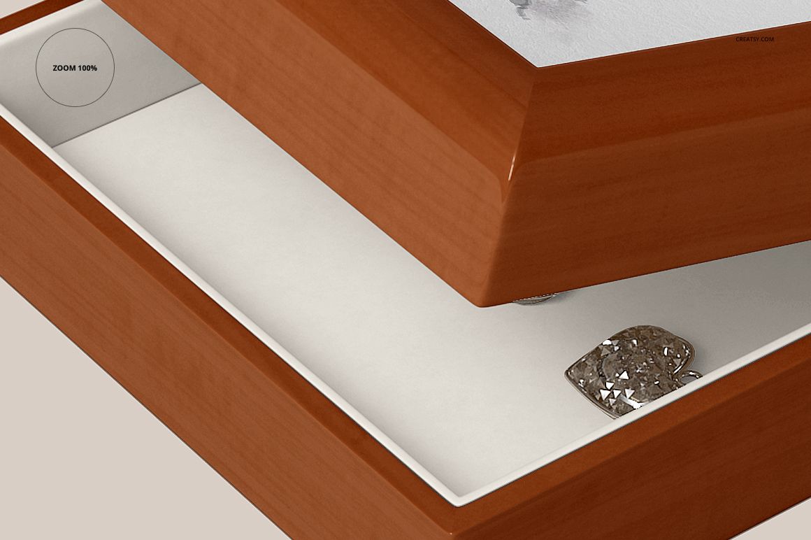 Close-up front view of a ceramic tiled wood jewelry box mockup with a brown wooden edge and white inner lining.