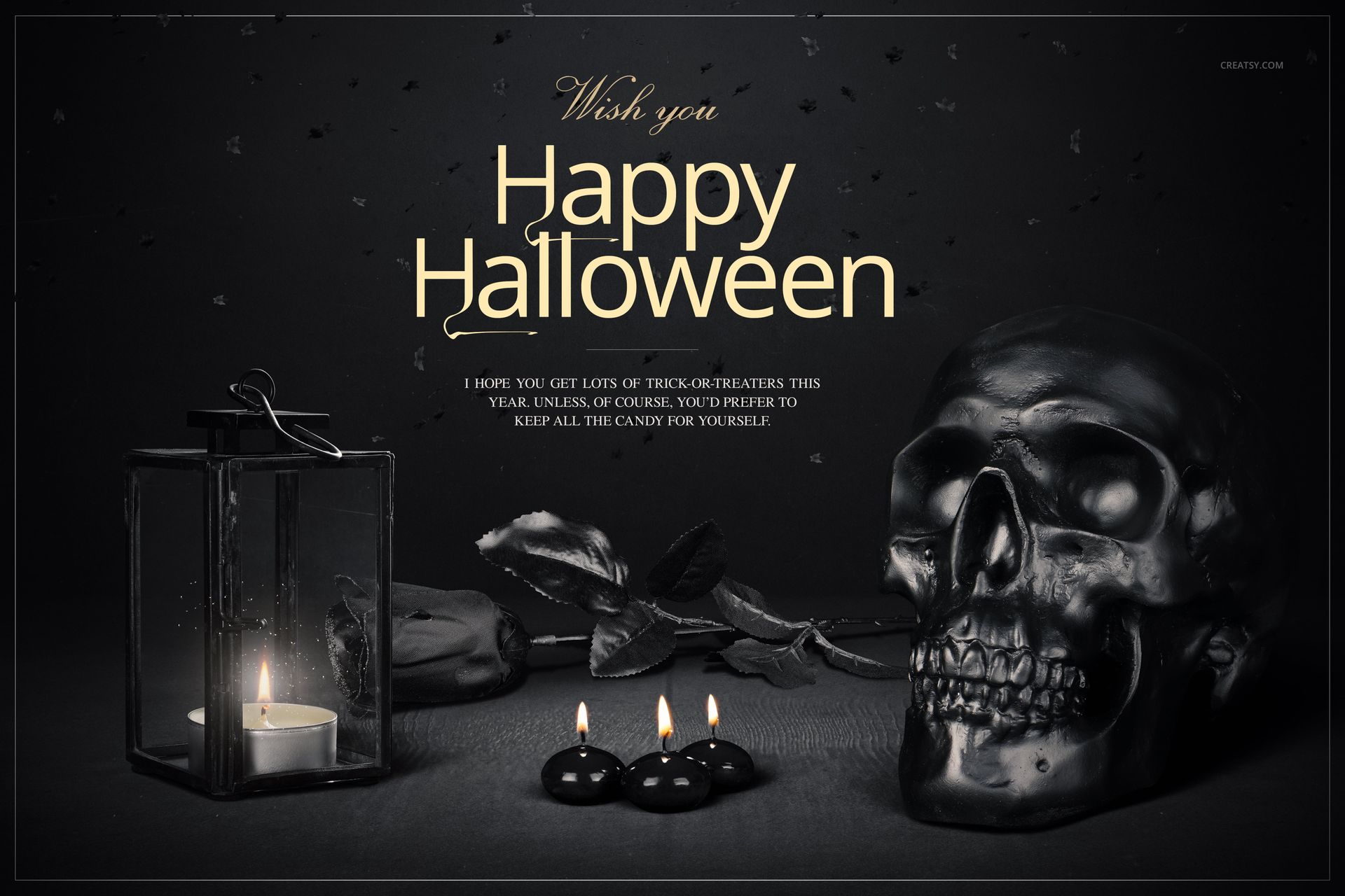 Halloween PSD mockup featuring a black skull, three black candles, a glass lantern, and scattered dark leaves.