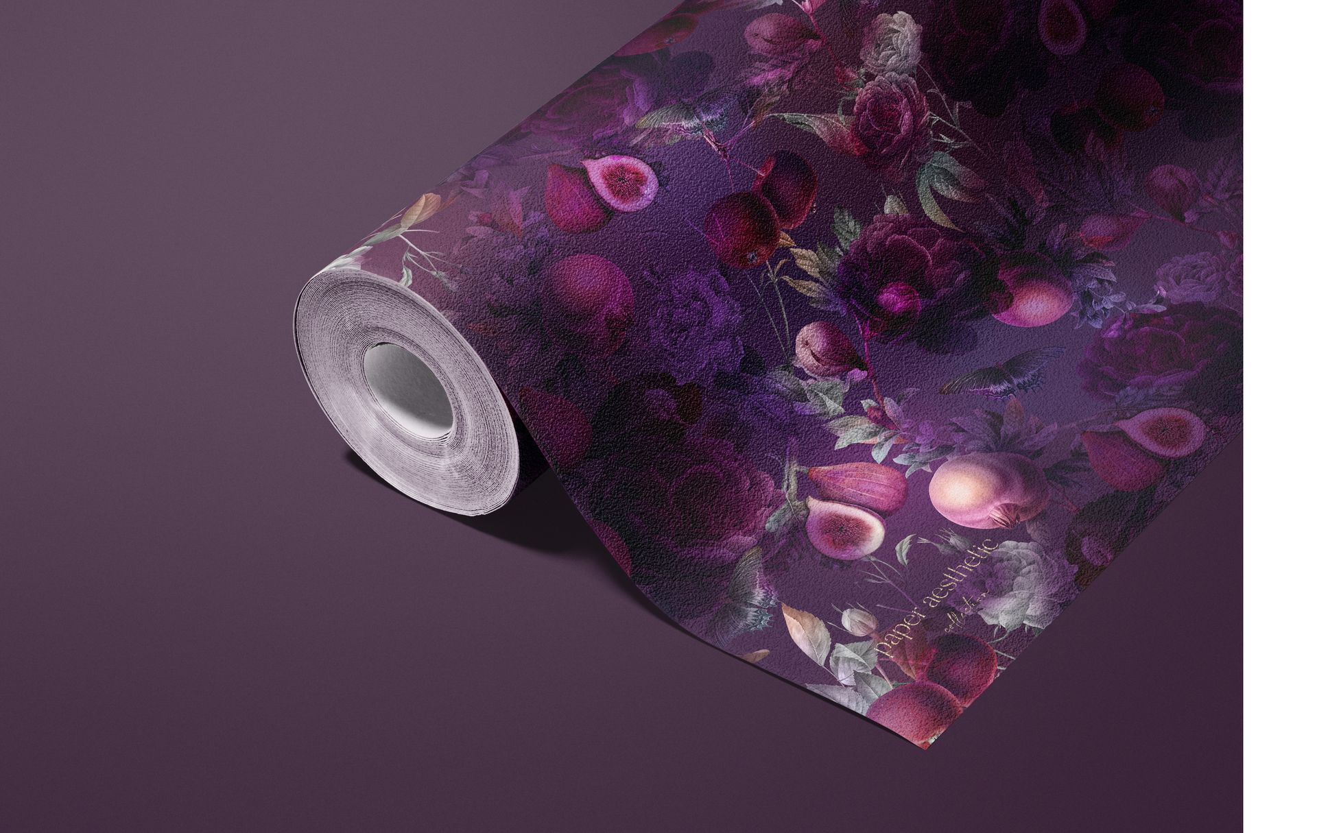 PSD mockup of a wallpaper roll displaying a textured surface with vibrant purple botanical and fruit motifs, front side view.