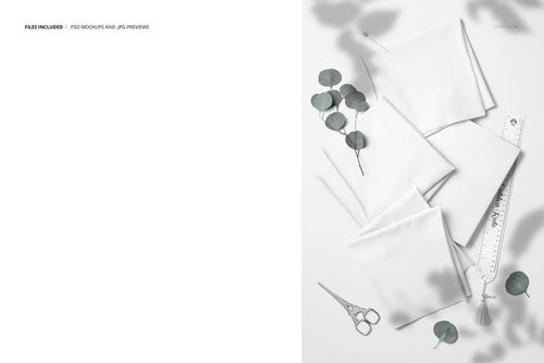 PSD mockup showing three white jersey fabrics folded next to a book, eucalyptus sprigs, scissors, and a ruler.