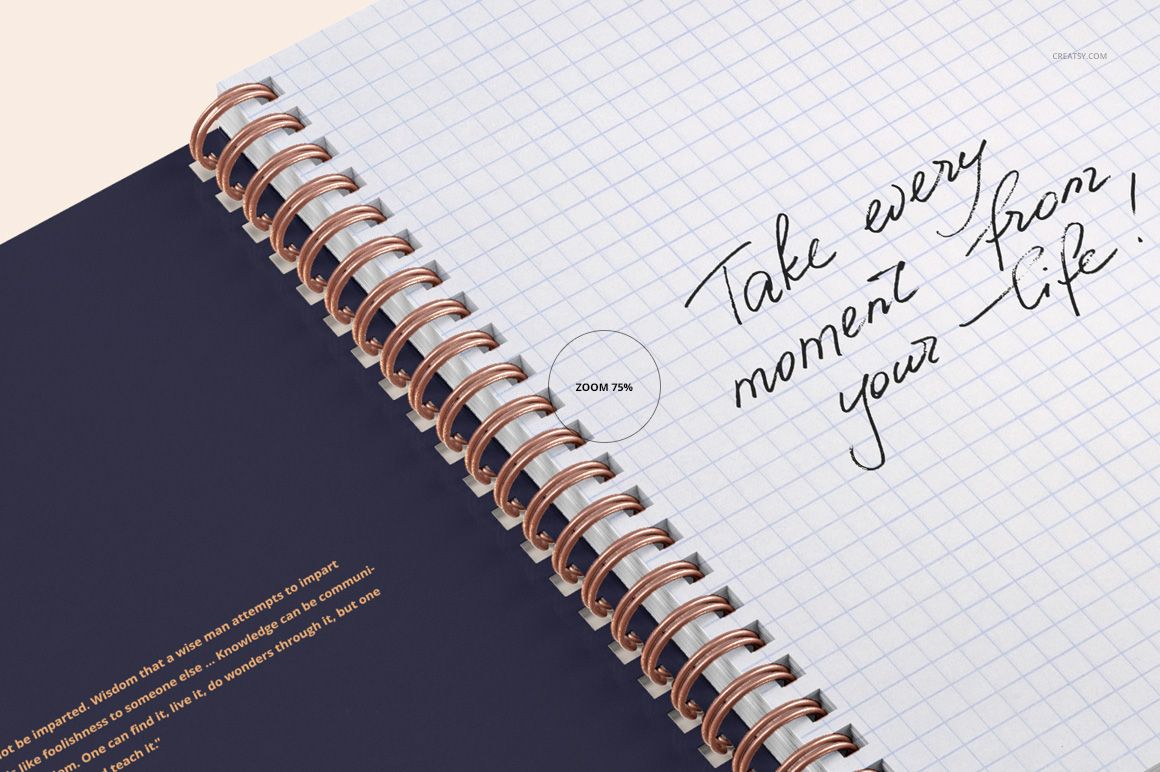 Close-up of a notebook mockup featuring copper spiral binding, grid paper, and handwritten notes on the right page.