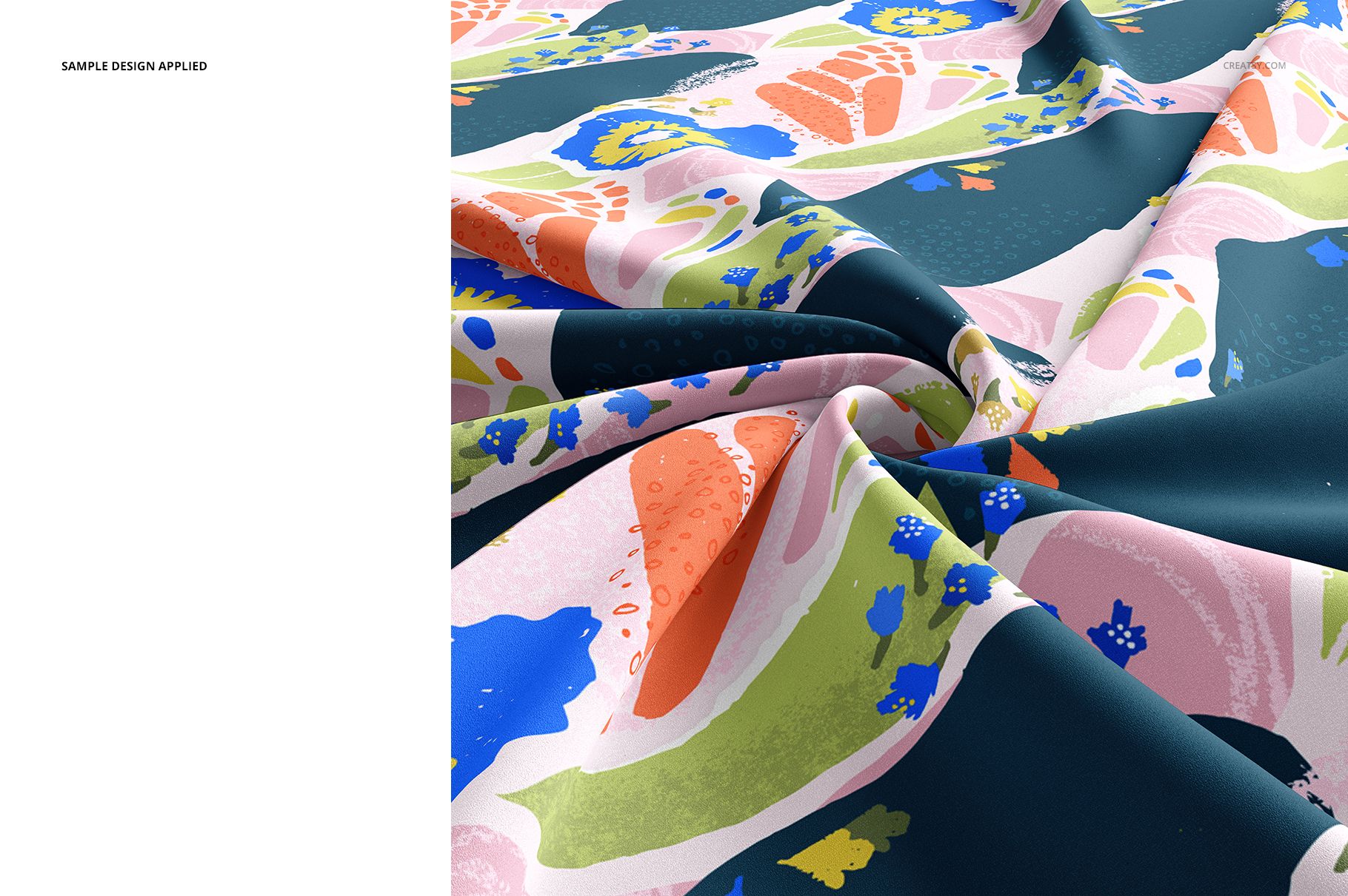 Close-up of silk fabric mockup with colorful abstract patterns in blue, pink, orange, and green tones, showing folds.