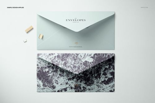 DL envelope mockup featuring a front view of two envelopes, one plain blue and one with a textured marbled design.