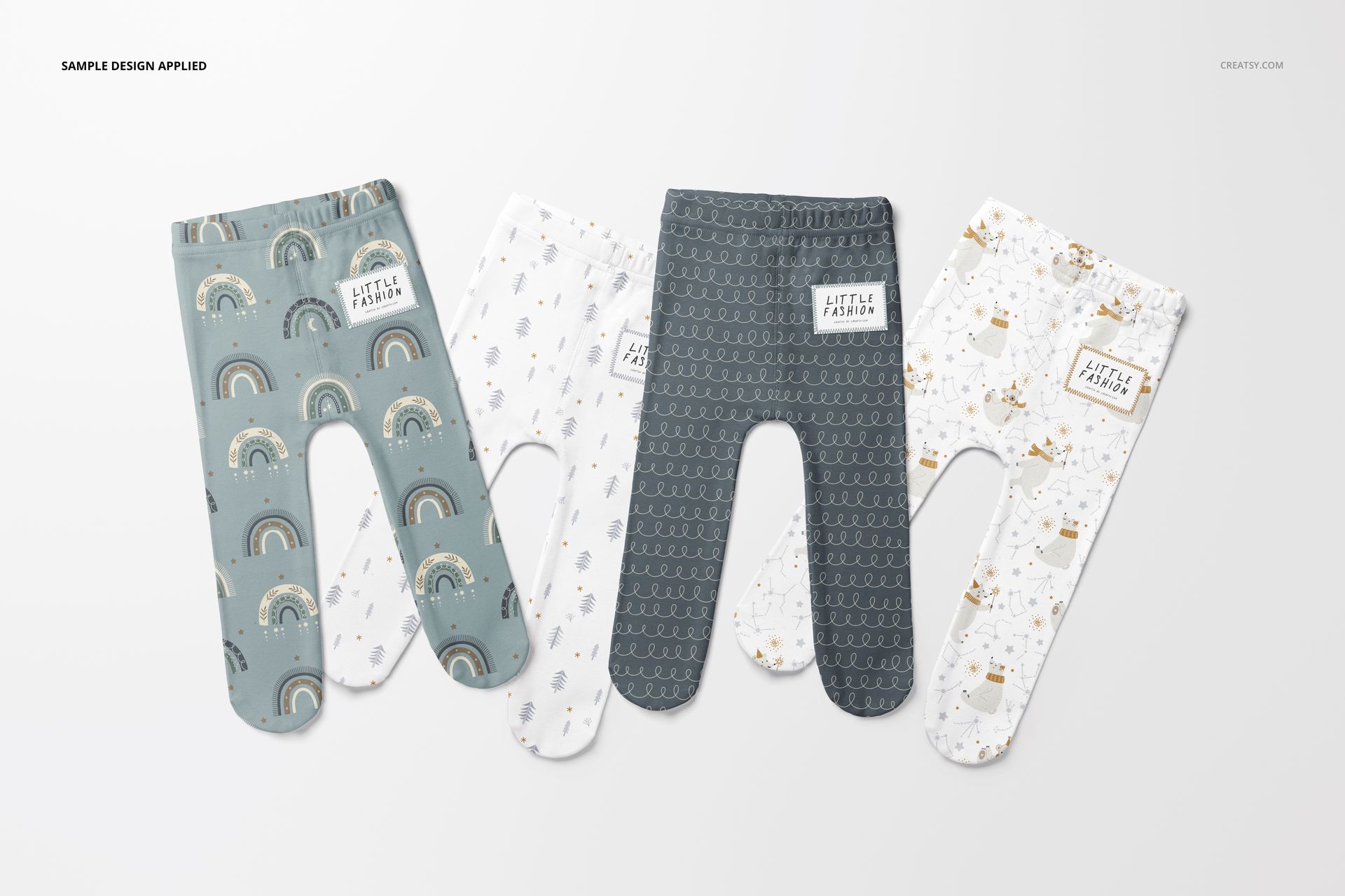 Set of three footed baby leggings mockup with assorted designs, shown from above on a clean white background.