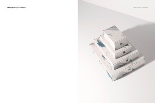 PSD mockup featuring layered mailing boxes with soft blue and gray accents, viewed from above on a clean surface.