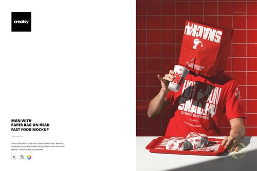 PSD mockup featuring a person with a red paper bag on their head, holding a red fast food tray and cup against a red tiled wall.