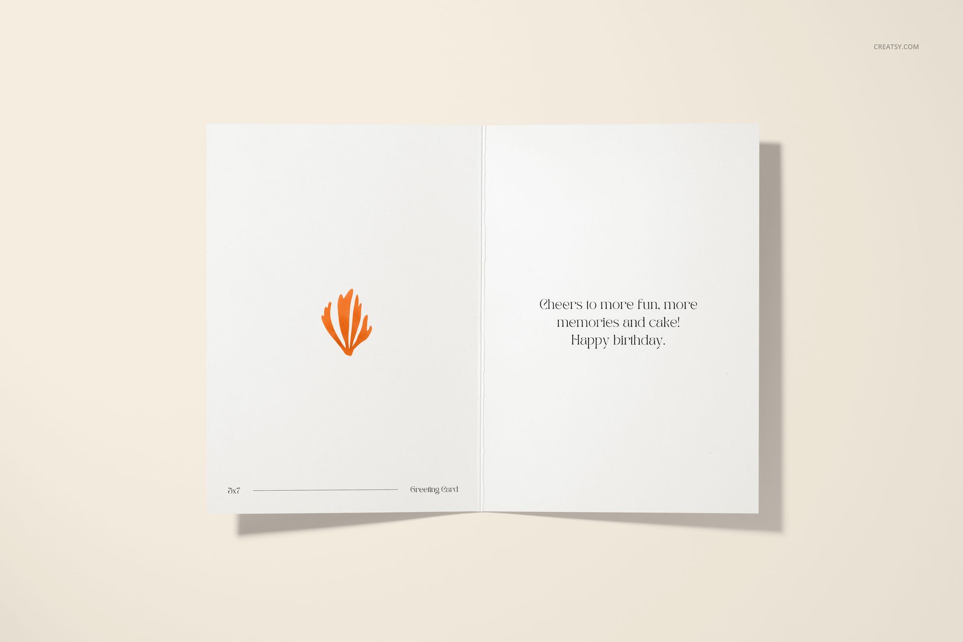 Open 5x7 greeting card mockup on a light beige surface, showing a simple orange graphic and birthday message inside.
