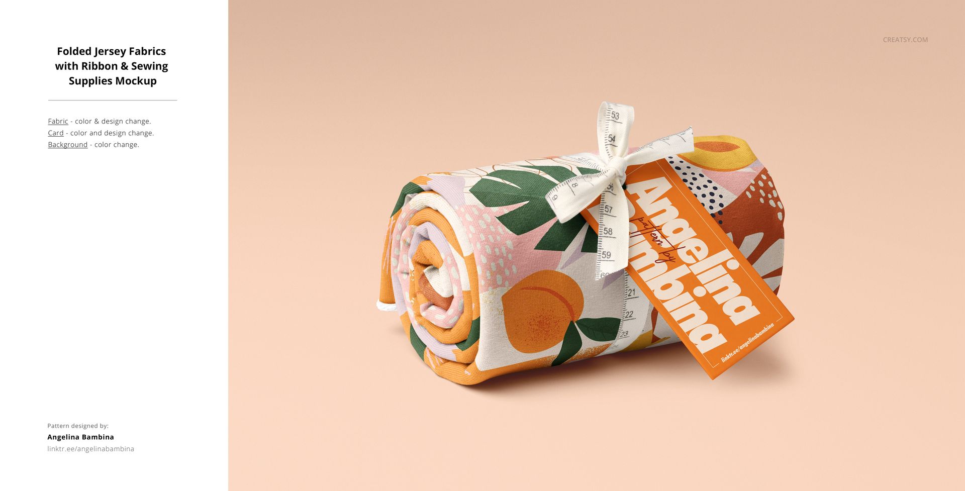 Folded jersey fabric mockup featuring orange and green fruit print, ribbon, and label, on a soft peach surface.