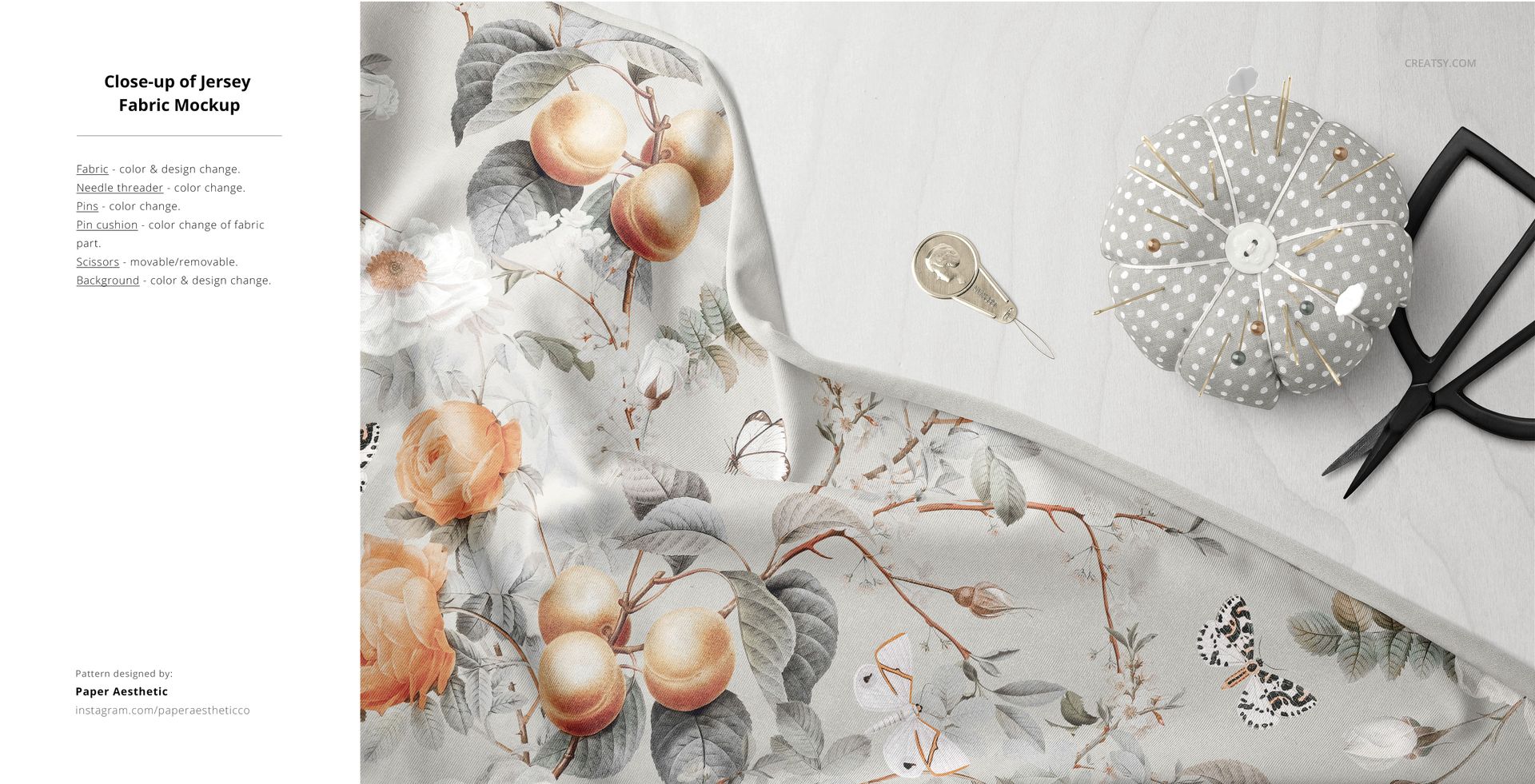Close-up of a fabric mockup featuring a floral and fruit pattern, displayed on a flat surface with sewing tools nearby.