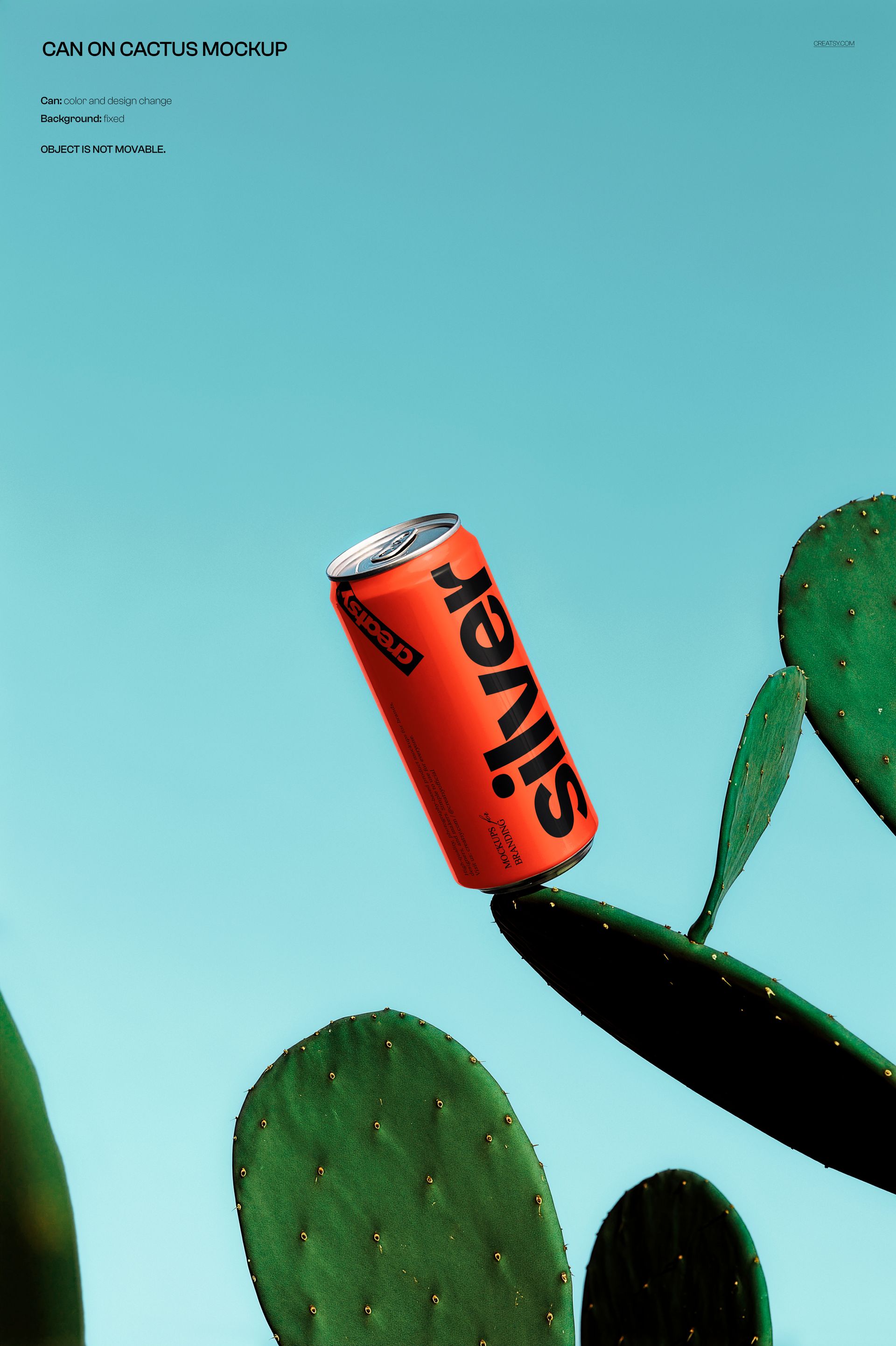 PSD mockup showing a red beverage can with silver text balanced on cactus leaves, set against a clear blue sky.