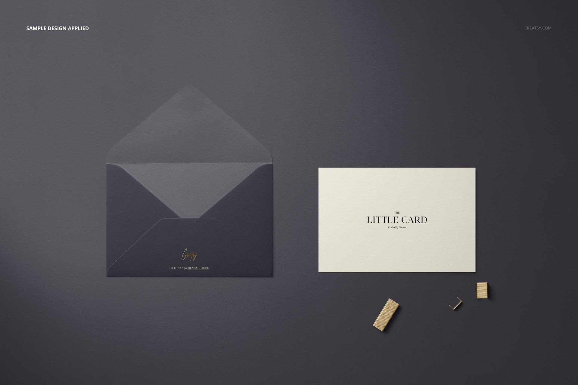 Envelope mockup set featuring a navy envelope and a simple card, shown from above on a neutral background.