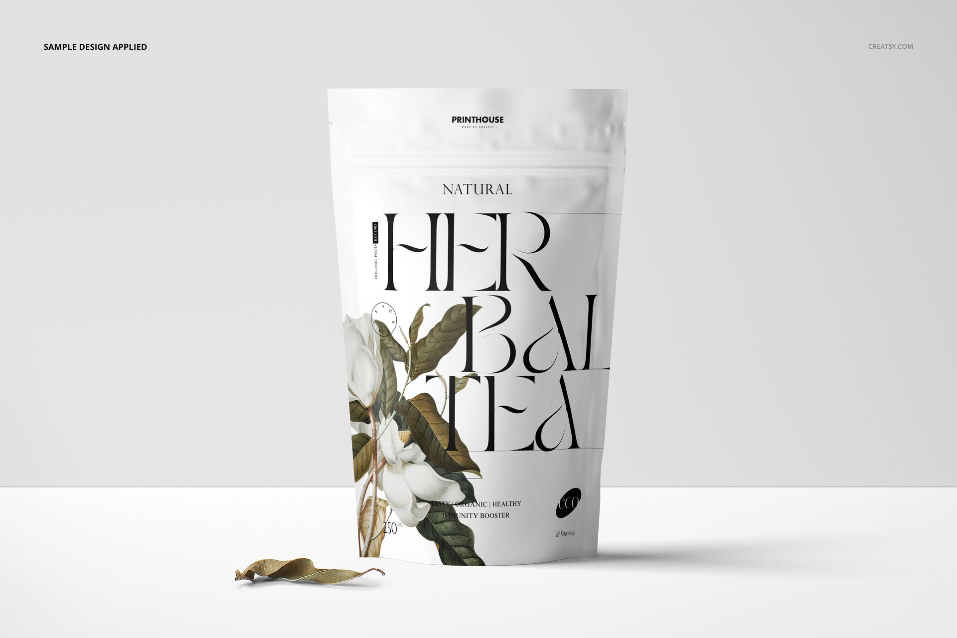 Stand up zip lock bag mockup displayed upright, showing a floral pattern and modern typography against a plain backdrop.