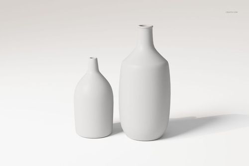 Front view of two decorative ceramic flower vases in matte white, displayed on a plain light background.