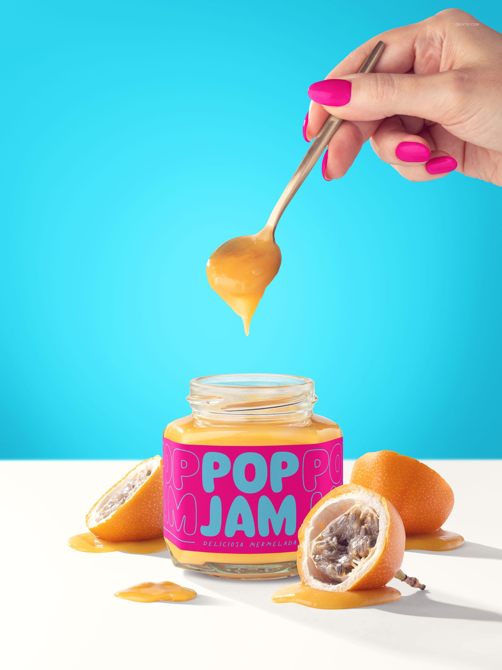 Granadilla jam jar mockup on white surface with vibrant blue background, fruits and spoon with jam visible.