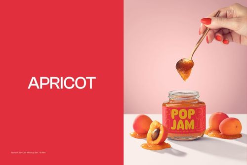 Apricot jam jar mockup with bright label, sliced apricots, and a hand dipping a spoon into the jar on a pale background.