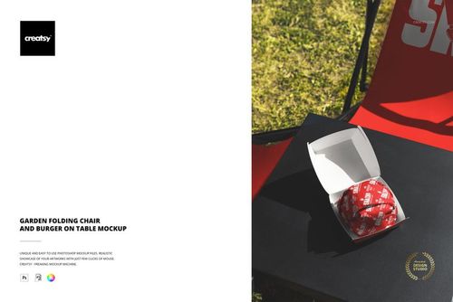 PSD mockup showing a red garden chair and a table featuring a wrapped burger inside an open white container.