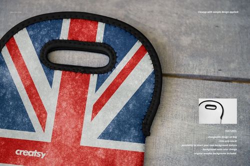 Front view of a wine bag mockup with a Union Jack flag pattern, black trim, and a cutout handle on a textured surface.