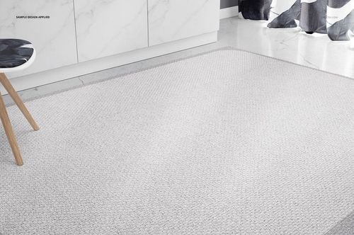 Textured kitchen rug mockup displayed on a light floor, with nearby white cabinets and a patterned stool visible.