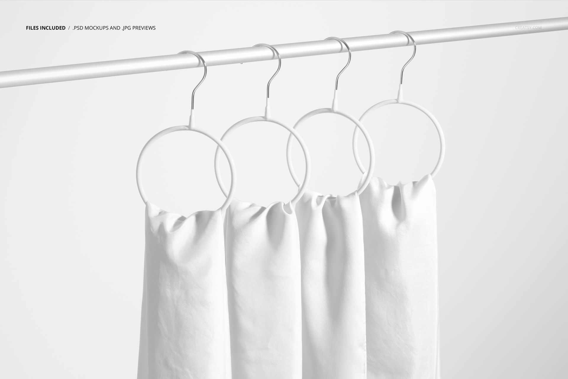Minimalist scene showing silk scarves in solid white, suspended from round hangers on a rod, suitable for mockup use.