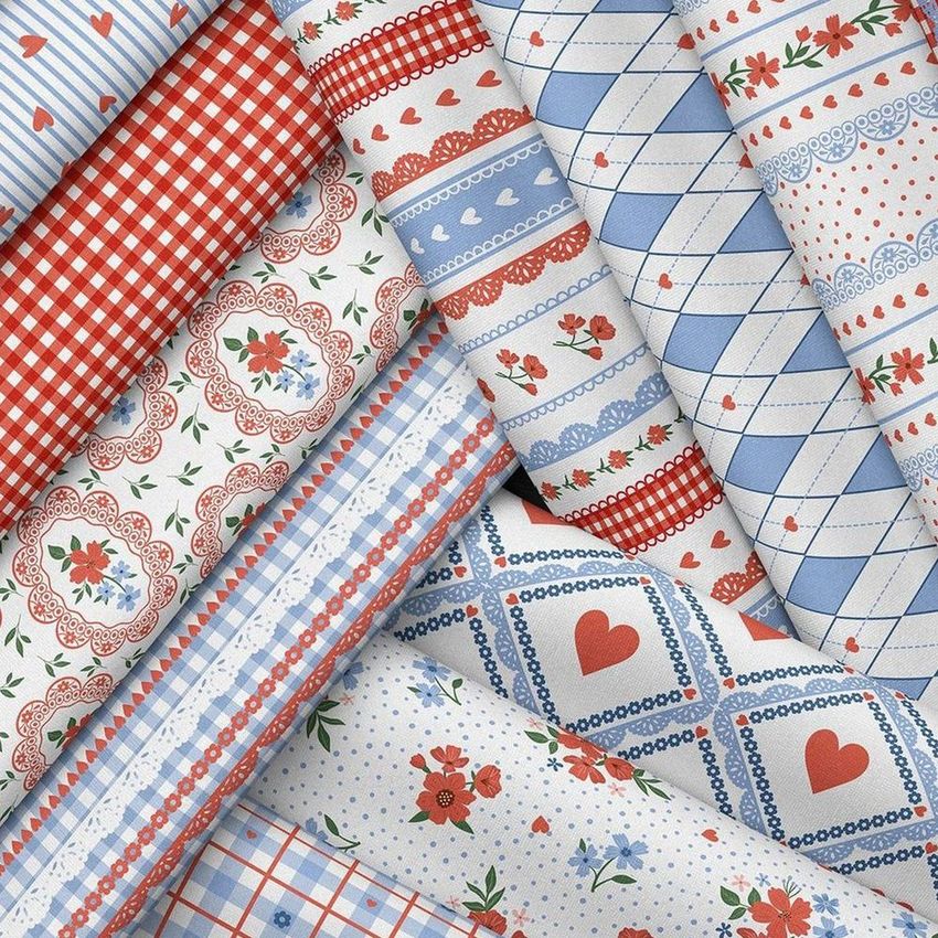 Folded fabrics mockup featuring multiple patterned textiles in red, blue, and white with floral, heart, and geometric designs.