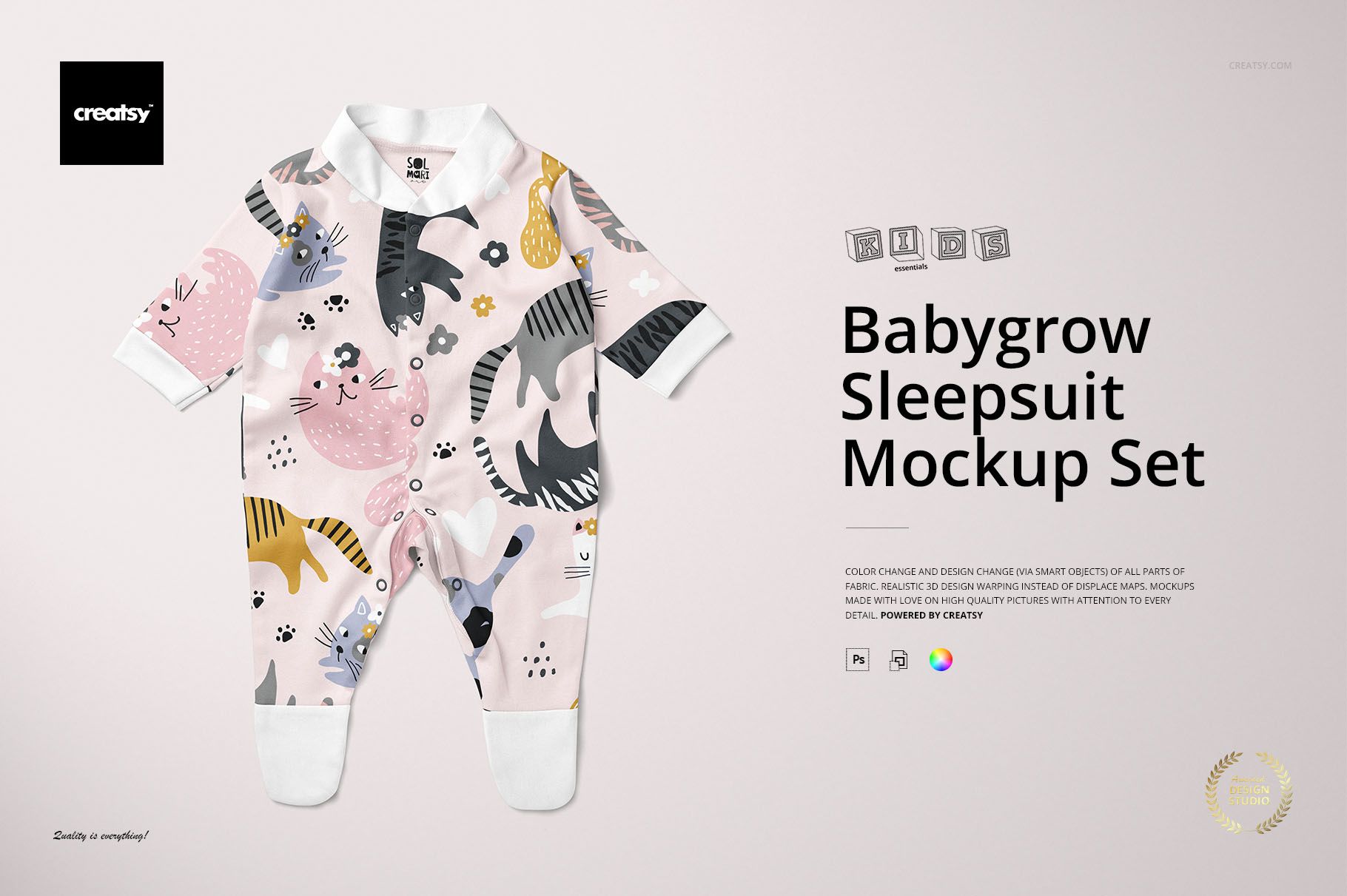 Front view of a babygrow sleepsuit mockup with playful cat and paw print patterns in pastel colors on a light background.