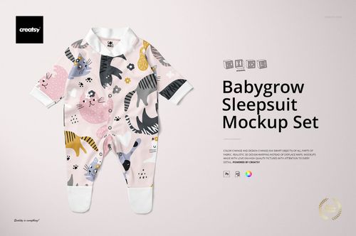 Front view of a babygrow sleepsuit mockup with playful cat and paw print patterns in pastel colors on a light background.