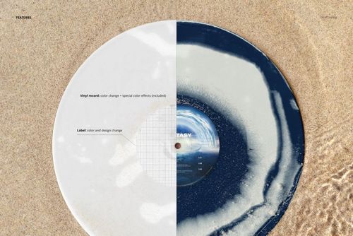 Vinyl record mockup on sandy beach, displaying half dark blue and half white design, surrounded by natural sand.