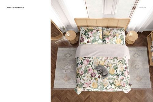Floral bedding mockup in a cozy bedroom, featuring a cat on the bed and soft natural lighting from large windows.