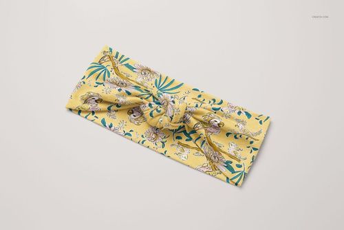 Adjustable kids headband mockup in PSD format, shown from above with a yellow background and whimsical print.