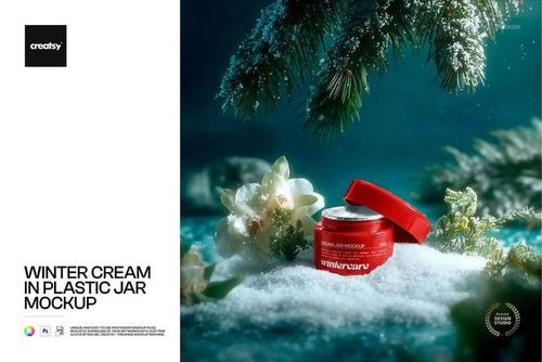 Cosmetic cream jar mockup in snow with festive pine branches and white flowers, viewed from the front in winter setting.