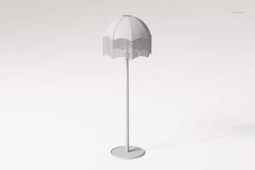Vintage style floor lamp with a round base, tall stand, and fringed dome-shaped shade in a neutral setting.