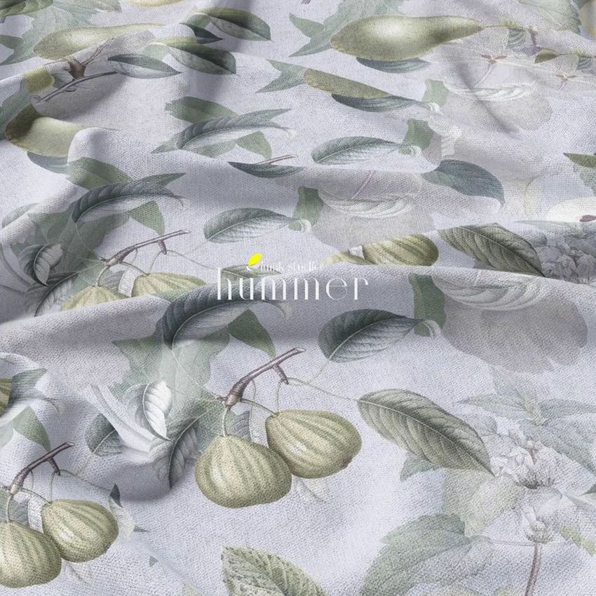 Curtains and upholstery fabric mockup featuring a botanical pattern with green leaves and fruit on a light textured surface.