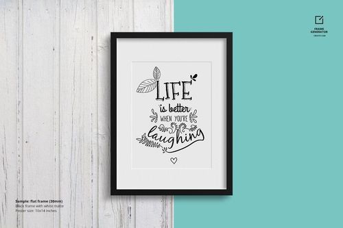 PSD mockup showing a framed art print in a black frame with white matte, placed on a background divided into wood and teal sections.