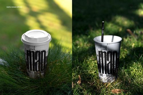 PSD mockup showing two paper cups outdoors on grass, one with a white lid and the other with a black straw, in natural light.