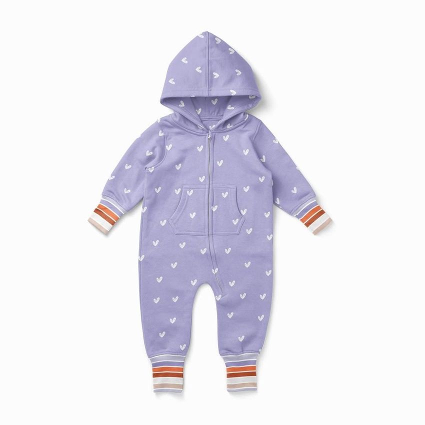 Baby onesie mockup featuring a lavender fleece suit with a hood, white heart pattern, and striped cuffs on a plain background.