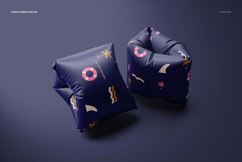Two navy inflatable swimming sleeves featuring playful beach icons and patterns, displayed on a dark background, PSD mockup.