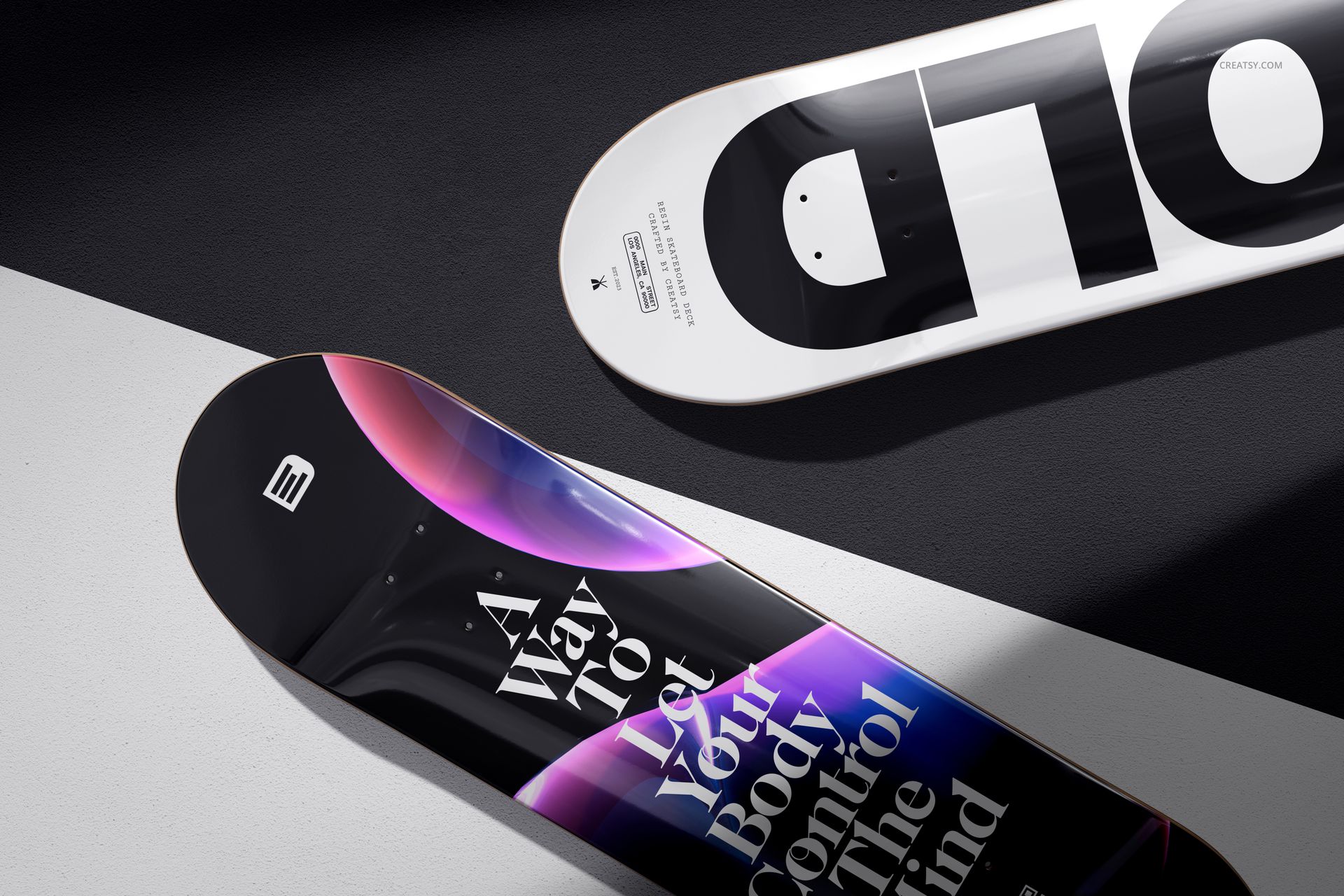 Mockup of epoxy resin skateboard decks with abstract and typographic artwork, displayed on angled surfaces.