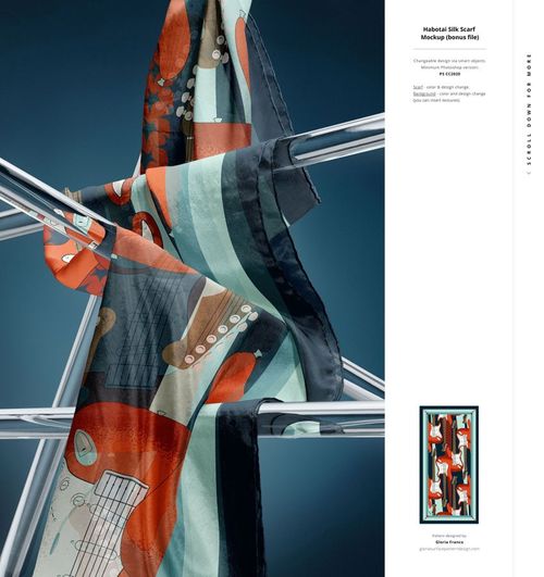 Abstract patterned silk scarf mockup featuring bold orange, teal, and black hues, displayed on metal rods, front angle.