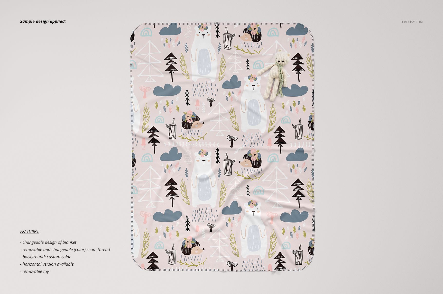 Kids blanket mockup featuring pastel-colored forest and animal patterns, displayed flat with a slight texture.