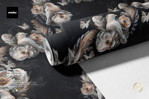 Close-up of non-woven vinyl wallpaper mockup with elegant floral and bird motifs, partially unrolled on a flat surface.