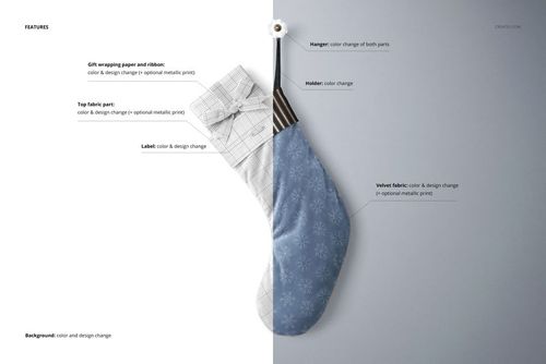 Front view of a velvet Christmas stocking mockup, half in blue with snowflake pattern and half in gray plaid, hanging on a wall.