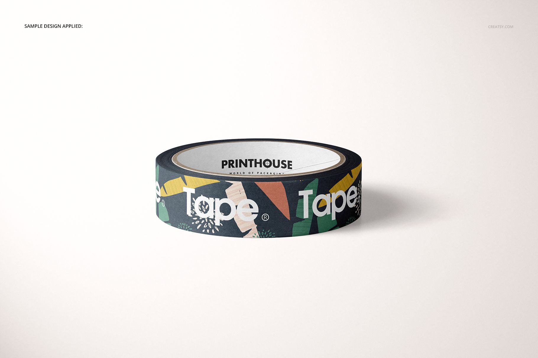 Paper packing tape with a colorful geometric pattern displayed on a plain light surface in a front view mockup.
