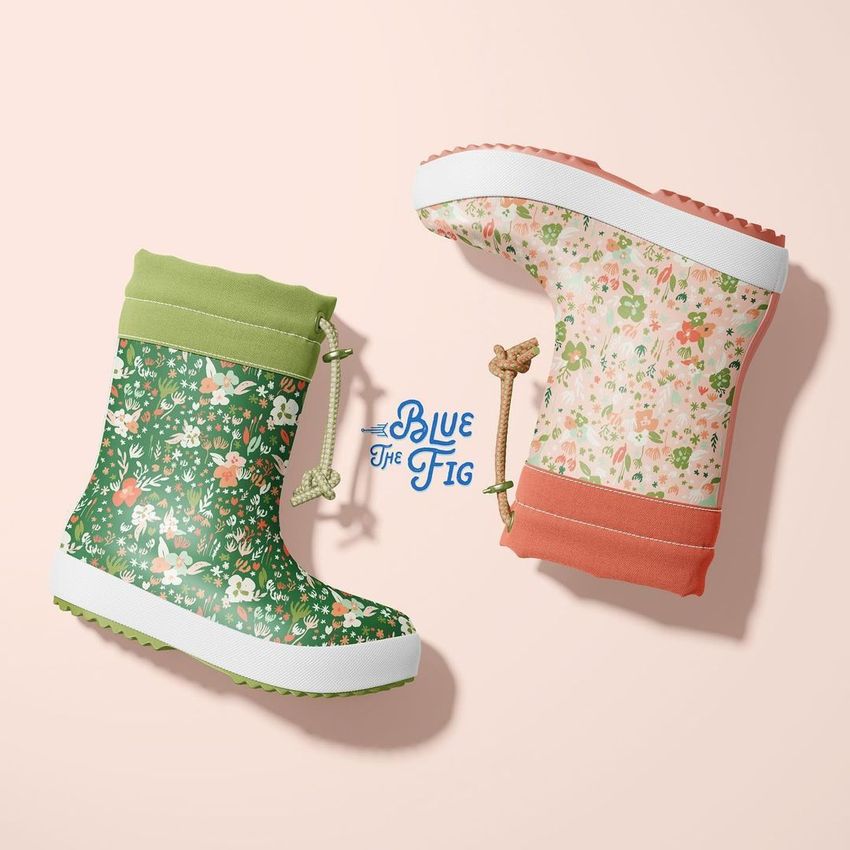 Rain boots mockup featuring two children's boots with floral patterns, displayed on a light pink background with a shadow effect.