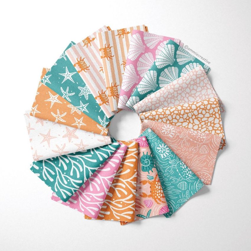 Folded fabric swatches mockup arranged in a circular pattern, featuring teal, orange, and pink seashell and starfish designs.