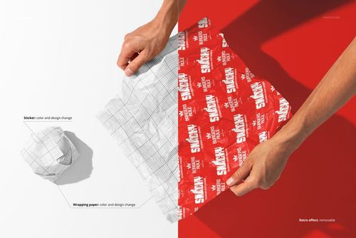 Burger wrapping paper mockup showing two hands holding grid-patterned and red branded sheets, top view split scene.