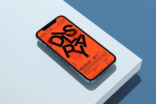 Front view of an iPhone 12 Pro with an orange screen mockup, placed on a white surface against a blue background.